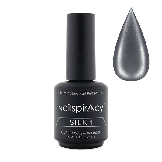 Nailspiracy Silk 1 cat eye gel bottle with a droplet of gel on a white background