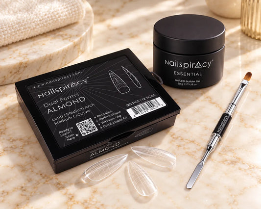 Nailspiracy ALMOND Dual Forms box, three clear forms, ESSENTIAL gel and double-ended brush.
