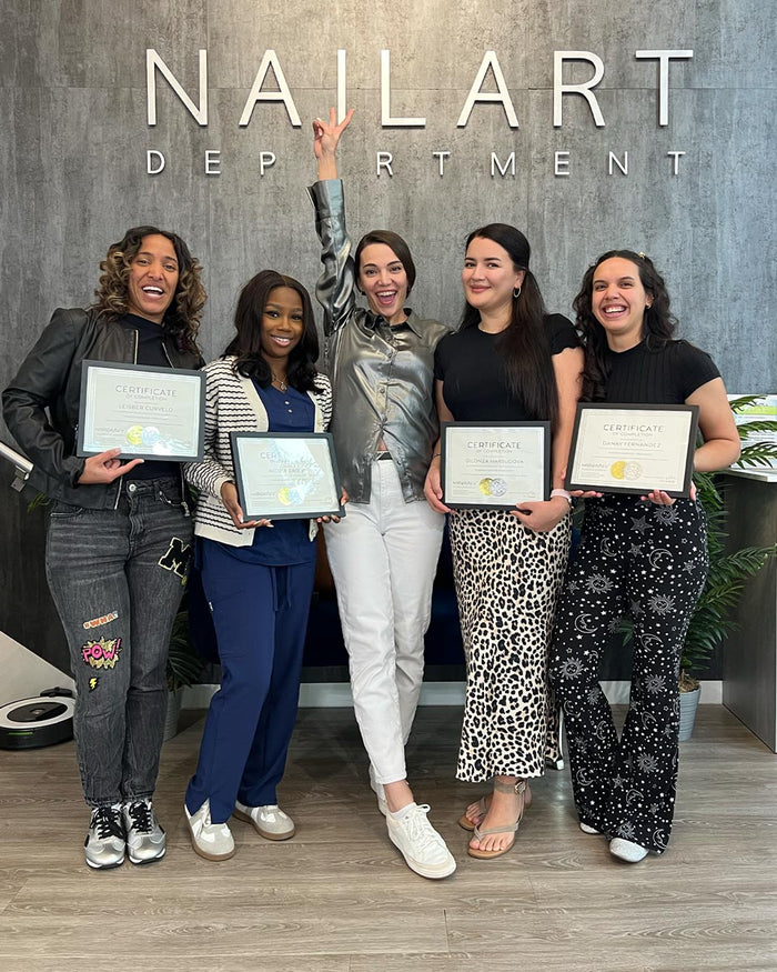 Nailspiracy Academy student with certificate