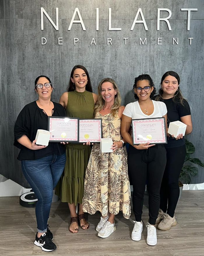 Nailspiracy Academy student with certificate
