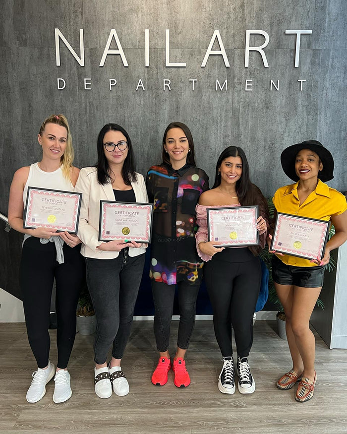 Nailspiracy Academy student with certificate