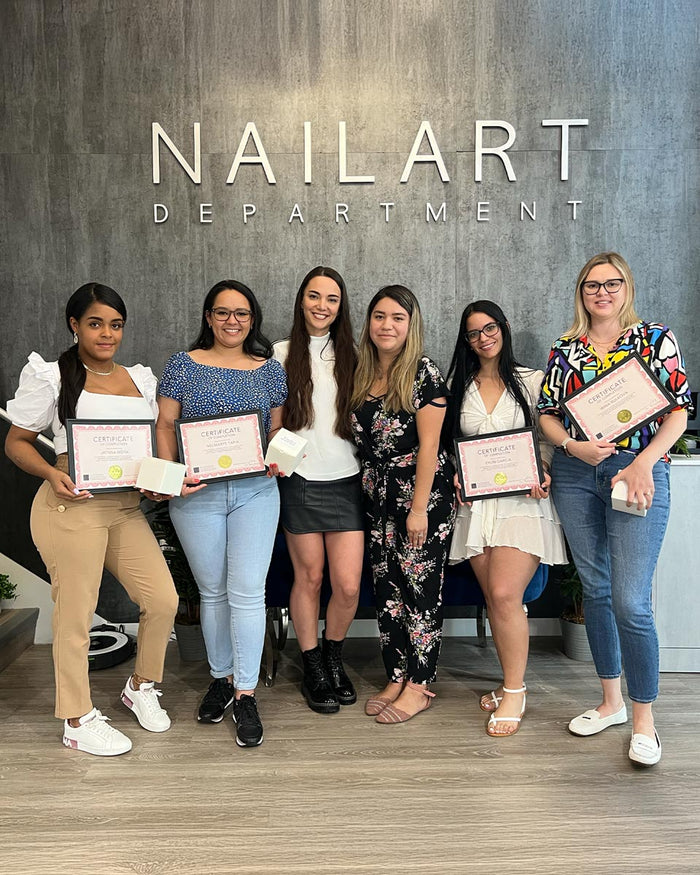Nailspiracy Academy student with certificate