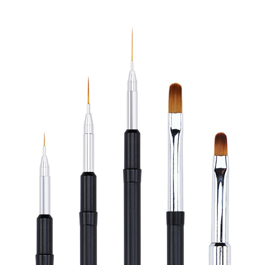 Set of five nail brushes with varying bristle shapes and sizes on a white background