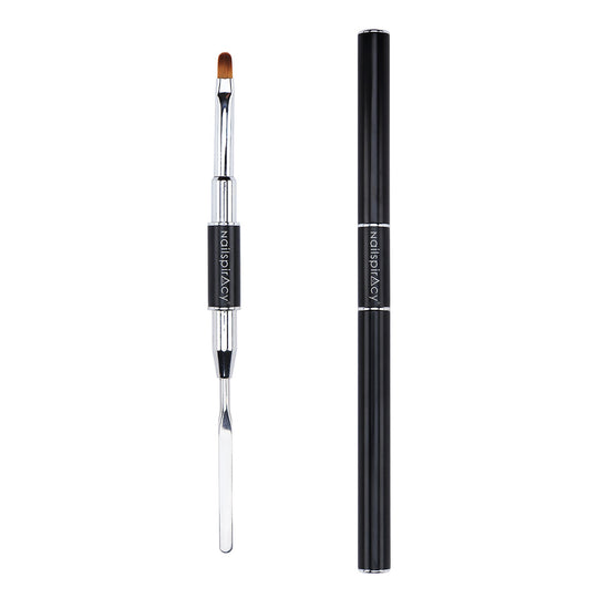 Nail brush with black handle and silver ferrule spatula on a white background