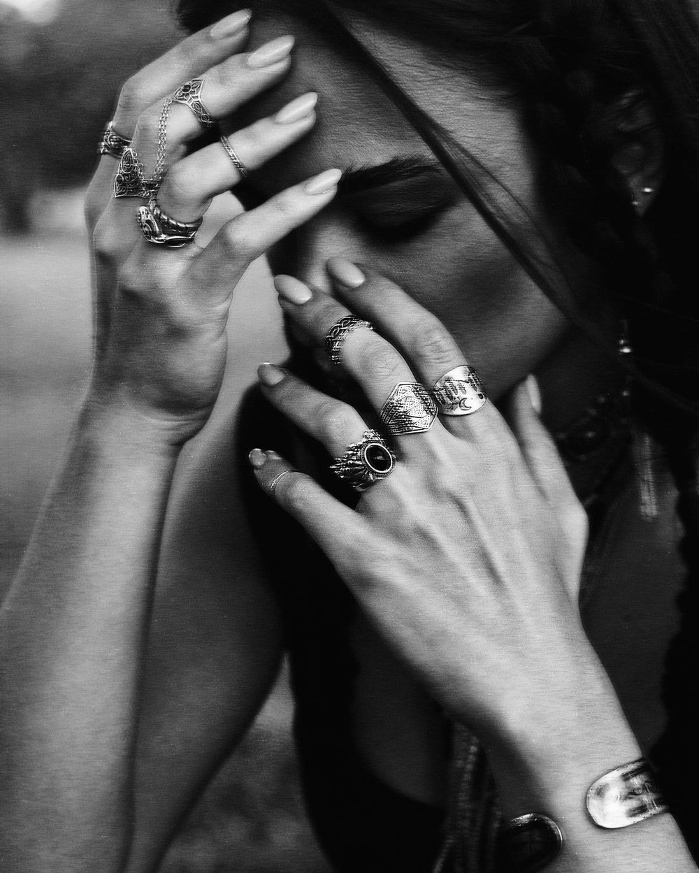 Black and white creative portrait of Siranush Ambartsumian in an outdoor editorial setting.