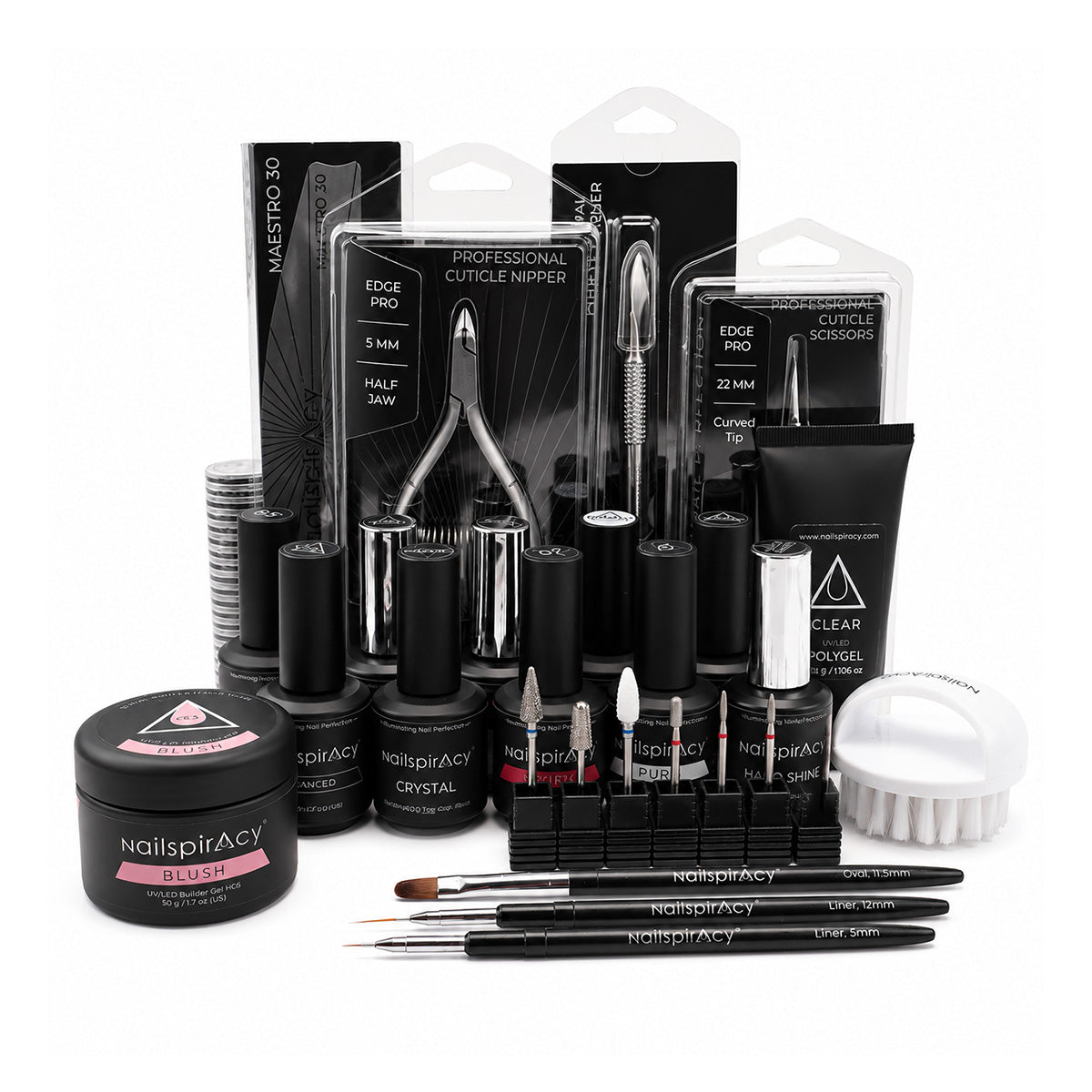 Collection of nail care products including polishes, tools, and accessories on a white background